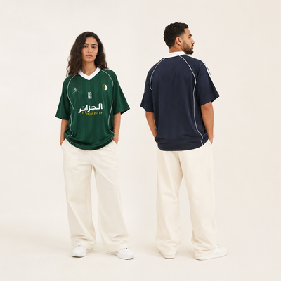 Green and navy piped Djazaïr jerseys worn front and back