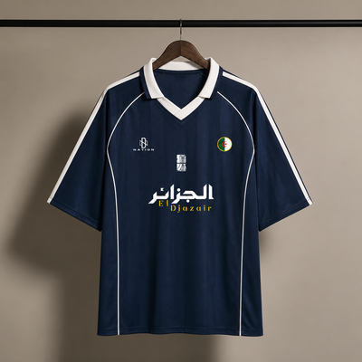 Navy piped Djazaïr jersey shown on a hanger