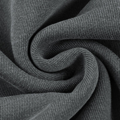 Gros plan sur le coton épais du sweat à capuche Sirocco gris