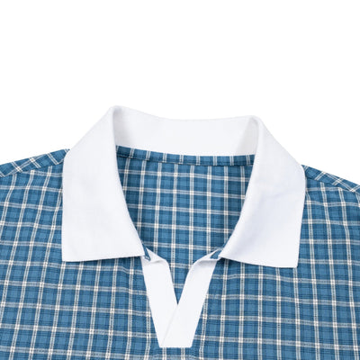 Col chemise blanc contrastant du polo Zellige