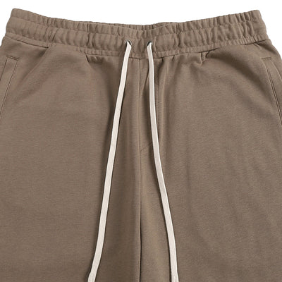 Détail de la taille élastique et du cordon du short Essentiel