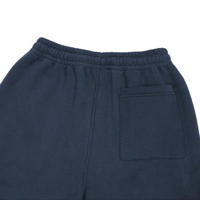 Pantalon Essentiel bleu marine présenté à plat avec taille élastique