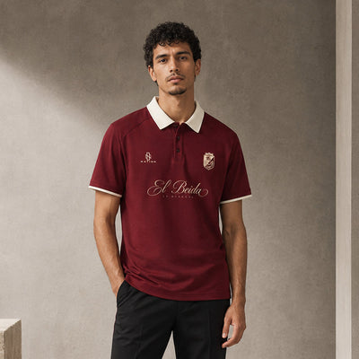 Polo El Beida bordeaux porté de face, col chemise blanc contrasté