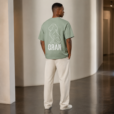 T-shirt Oran vert avec lion et inscription ORAN imprimés au dos