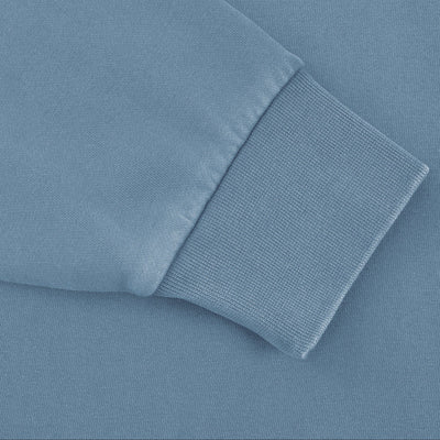 Détail de la manche et du poignet côtelé du sweat Sirocco bleu