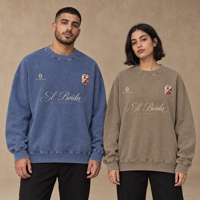Sweatshirts El Beida bleu et taupe portés par un homme et une femme
