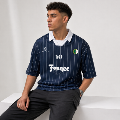 Navy Fennec number 10 jersey worn seated, white polo collar