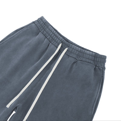 Détail de la taille élastique et du cordon du pantalon Délavé