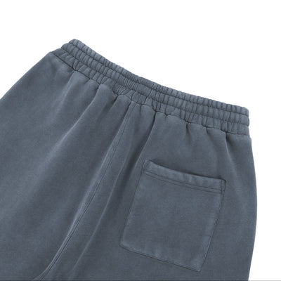 Détail de la poche arrière du pantalon Délavé