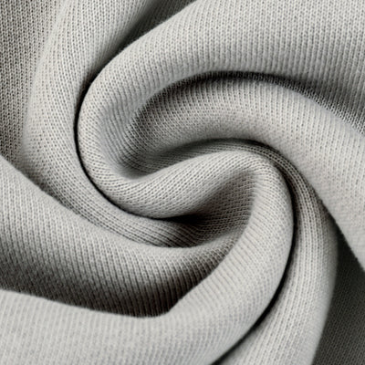 Gros plan sur le coton épais délavé du sweat zippé Sirocco