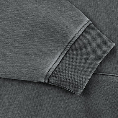 Détail du poignet côtelé du sweat à capuche Sirocco gris