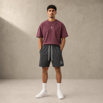 Short Essentiel noir porté dans une tenue sport