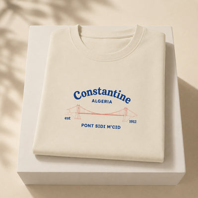 T-shirt Constantine écru plié avec design Pont Sidi M’Cid