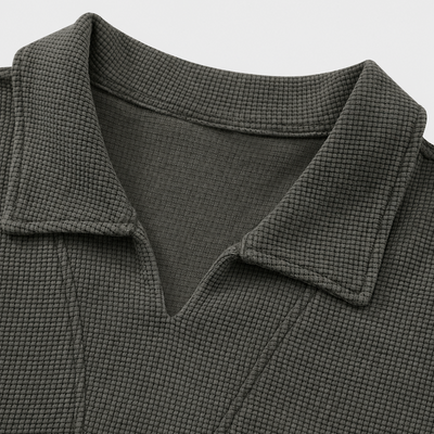 Col V ouvert sans boutons du polo El Beida gaufré